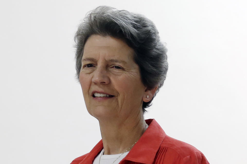 FILE - This is a May 14, 2013, file photo showing Seattle Storm assistant coach Nancy Darsch during the team's media day in Seattle. Darsch, who guided the Ohio State women's basketball team to the 1993 title game and went on to coach in the WNBA, died Monday, Nov. 2, 2020, in her hometown of Plymouth, Massachusetts. She was 68.(AP Photo/Elaine Thompson, File)