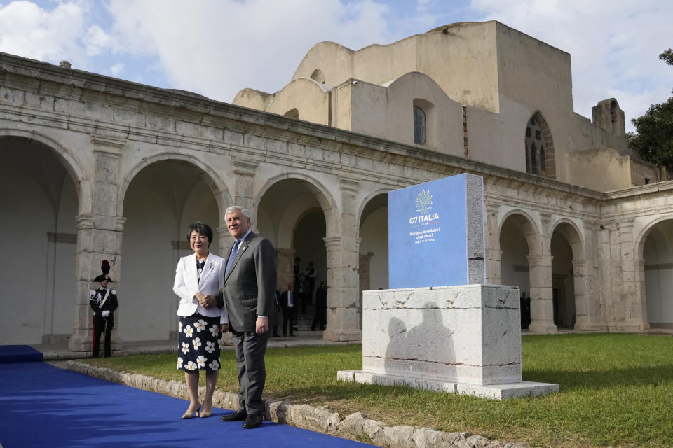 Italian Foreign Minister Antonio Tajani, right, welcomes Japanese Foreign Minister Yoko Kamikawa at the G7 Foreign Ministers meeting, on the Island of Capri, Italy, Wednesday, April 17, 2024. Group of Seven foreign ministers are meeting on the Italian resort island of Capri, with soaring tensions in the Mideast and Russia's continuing war in Ukraine topping the agenda. The meeting runs April 17-19. (AP Photo/Gregorio Borgia)