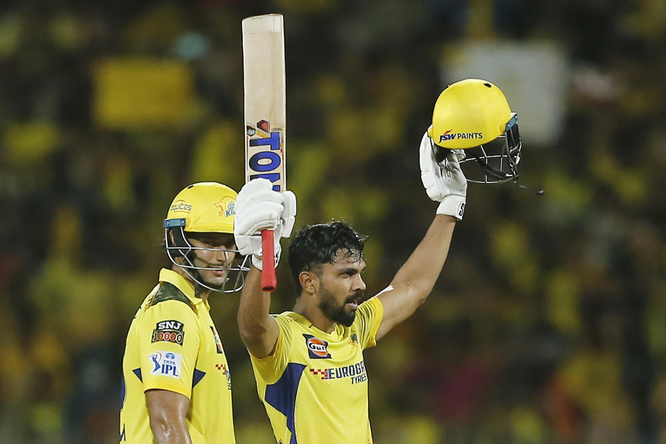 Chennai Super Kings' Captain Ruturaj Gaikwad celebrates scoring a century as Shivam Dube watches during the Indian Premier League cricket match between Chennai Super Kings and Lucknow Super Giants in Chennai, India, Tuesday, April 23, 2024. (AP Photo/R.Parthiban)