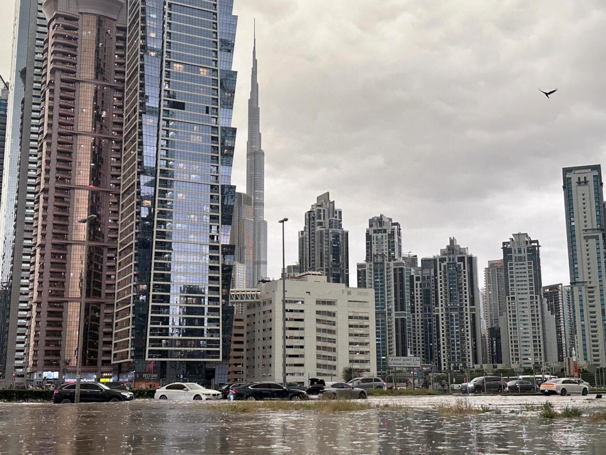 PHOTO: A general view of floods caused by heavy rains, with the Burj Khalifa tower visible in the background, in Dubai, United Arab Emirates, April 16, 2024.  (Abdelhadi Ramahi/Reuters)