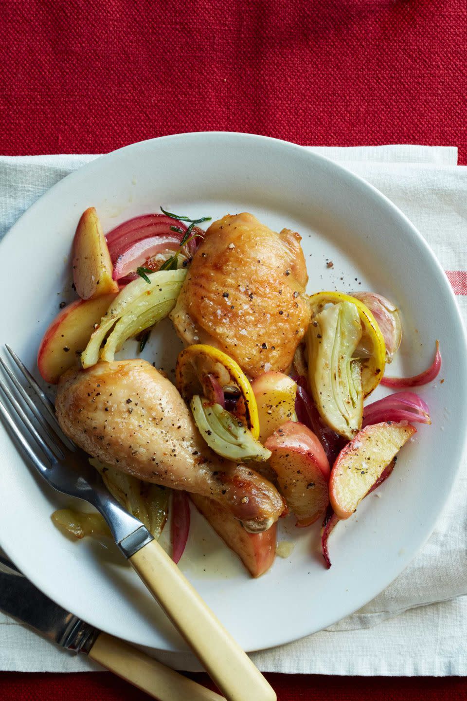 <p>Apples switch from sweet to savory in this simple-to-make Sunday dinner that's perfect for fall.</p><p><a rel="nofollow noopener" href="https://www.womansday.com/food-recipes/food-drinks/recipes/a12538/roasted-chicken-apples-onions-recipe-wdy1014/" target="_blank" data-ylk="slk:Get the recipe.;elm:context_link;itc:0;sec:content-canvas" class="link "><strong>Get the recipe.</strong></a></p>