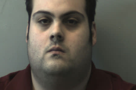 FILE PHOTO: Daniel Frisiello, charged with sending a series of threatening letters containing a suspicious powder, including one addressed to U.S. President Donald Trump’s eldest son, Donald Trump Jr., appears in a booking photo provided by the Beverly Police Department, Massachusetts, U.S., March 1, 2018. Beverly Police Department/Handout via REUTERS