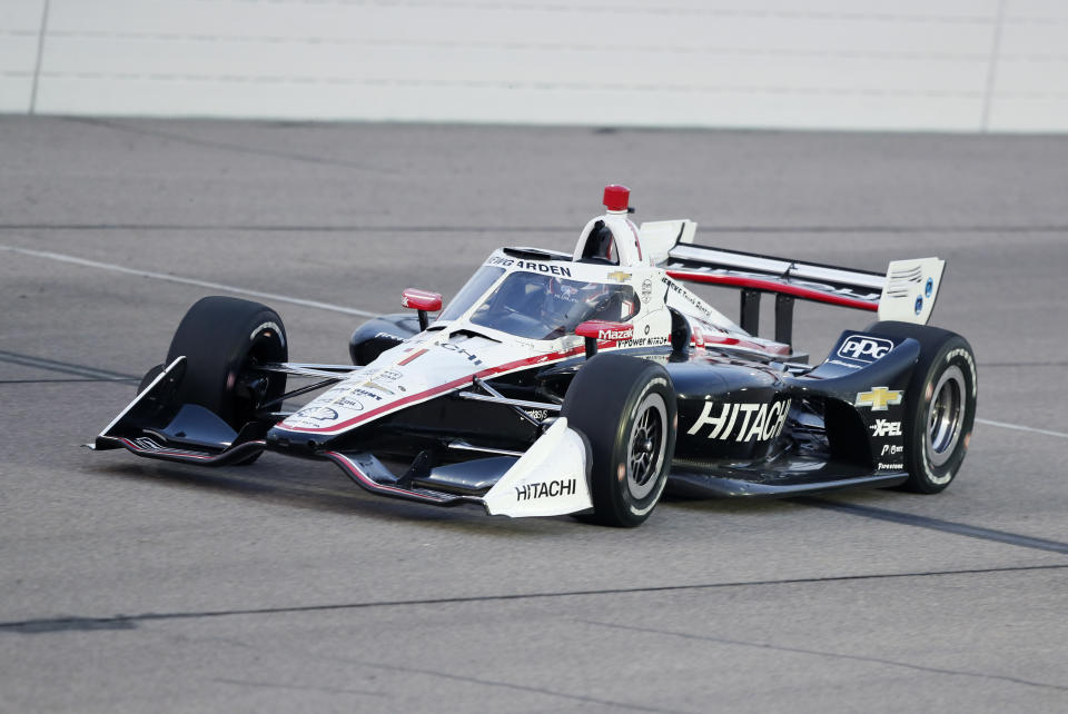 Josef Newgarden races his car during the IndyCar Series auto race Friday, July 17, 2020, at Iowa Speedway in Newton, Iowa. (AP Photo/Charlie Neibergall)