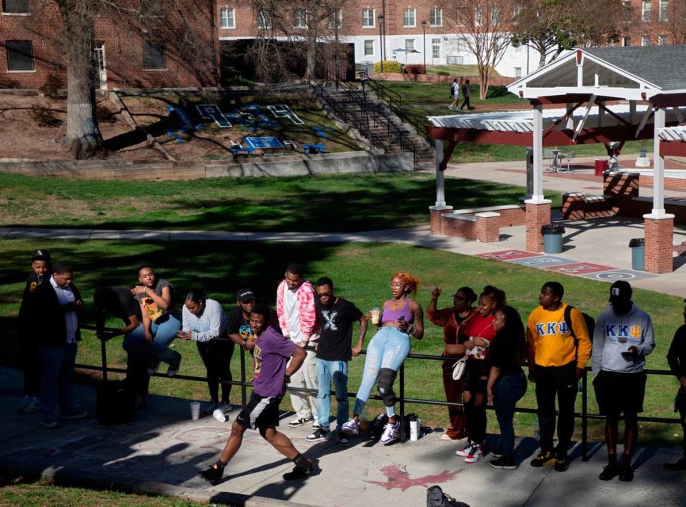 People dance outdoors on the campus of North Carolina Central University on Tuesday, March 12, 2024, in Durham, N.C.