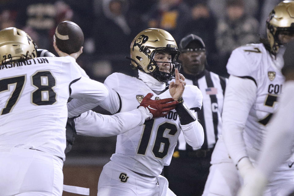 Colorado quarterback Ryan Staub (16) throws a pass during the first half of the team's NCAA college football game against Washington State, Friday, Nov. 17, 2023, in Pullman, Wash. (AP Photo/Young Kwak)