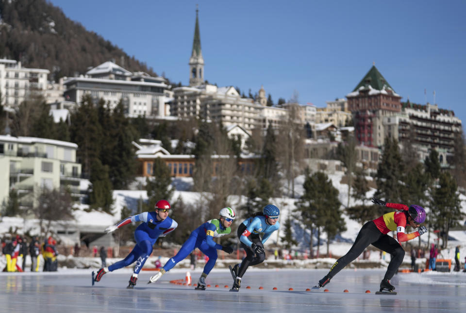 In this photo provided by the IOC, from left, Sander Eitrem, of Norway, Nicky Rosanelli, of Italy, Fran Vanhoutter, of Belgium and Luisa Maria Gonzalez Salazar, of Spain, compete in the sixth heat of the Speed Skating Mixed NOC Team Sprint event of the 2020 Winter Youth Olympic Games in St. Moritz, Switzerland, Wednesday, Jan. 15, 2020. (Thomas Lovelock for OIS via AP)