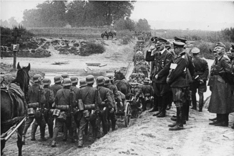 German leader Adolf Hitler presides over infantry soldiers during Germany's invasion of Poland in September 1939. File Photo courtesy Das Bundesarchiv