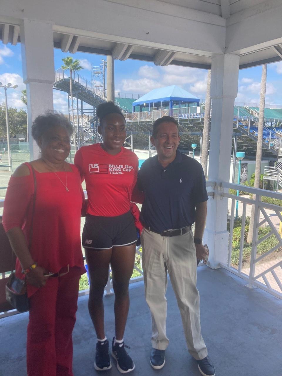 Coco Gauff, flanked by her grandma ,Yvonne Odom, and Delray Beach Vice Mayor Adam Frankel, pose  are photographed together in Delray Beach in 2020.