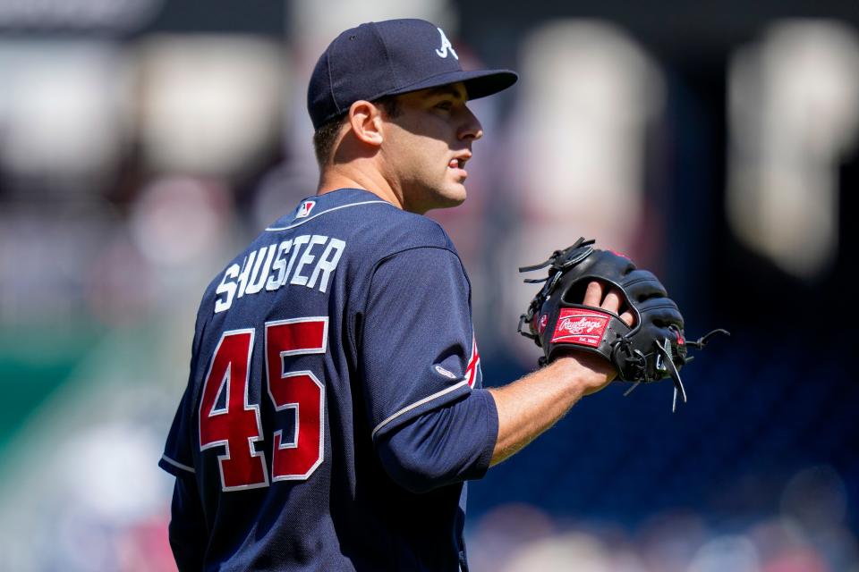 Atlanta Braves starting pitcher Jared Shuster waits for the ball during the first inning of a baseball game against the Washington Nationals at Nationals Park, Sunday, April 2, 2023, in Washington.