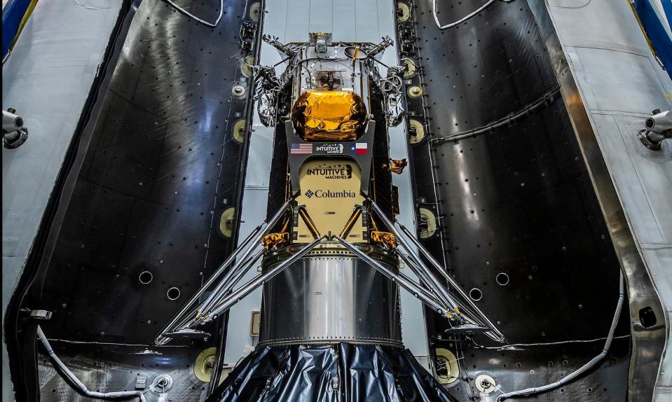 Intuitive Machines' Nova-C class lunar lander is encapsulated within a SpaceX Falcon 9 payload fairing in preparation for launch.