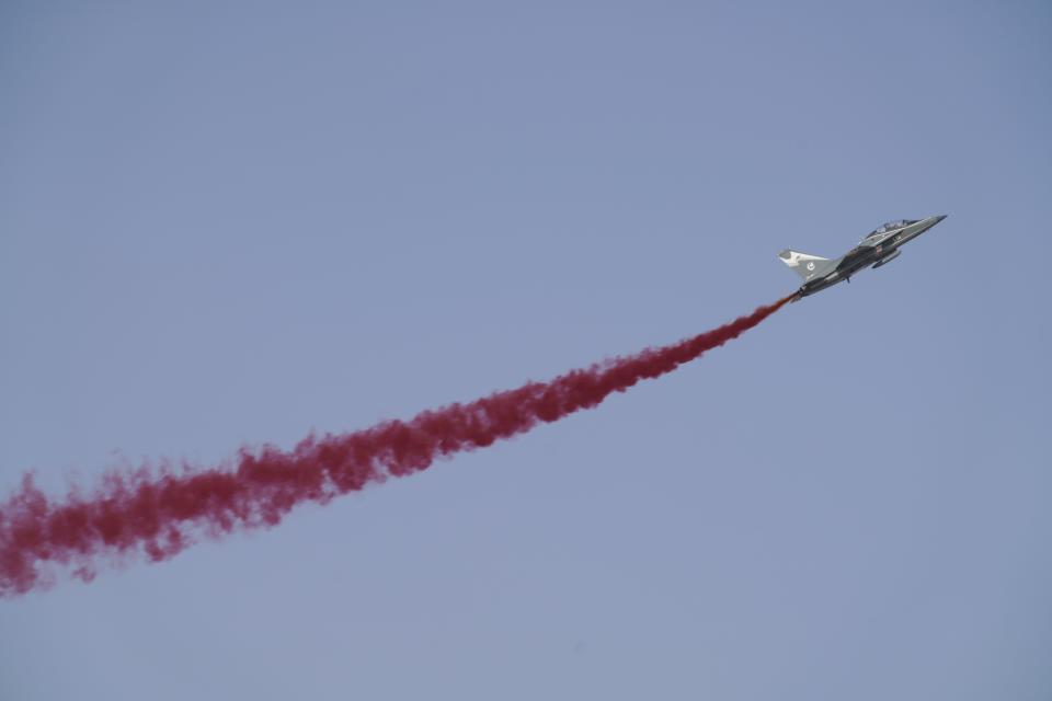 A Chinese L-15 trainer fighter jet performs a stunt at the Dubai Air Show in Dubai, United Arab Emirates, Wednesday, Nov. 17, 2021. (AP Photo/Jon Gambrell)