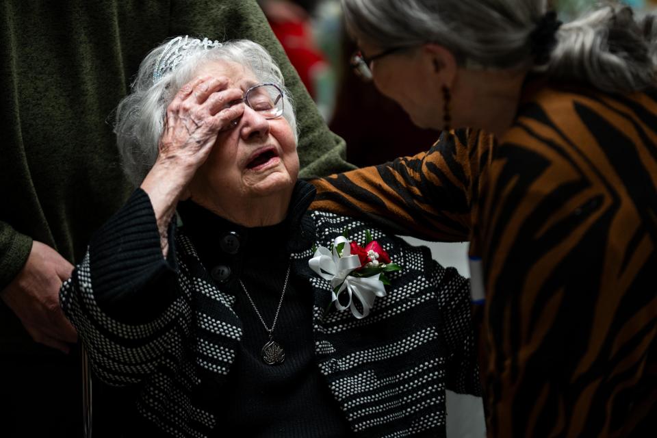 Family and friends stop and say hello as they celebrate the 100th birthday of Mary Bierma Wednesday, Dec. 27, 2023, at Glen Echo Church in Des Moines.