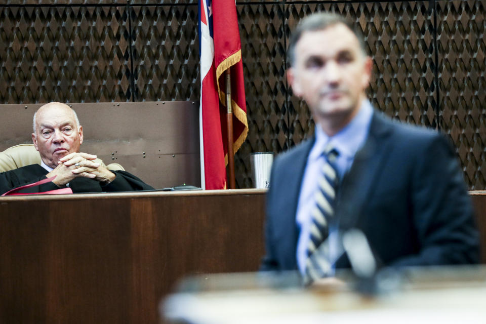 Judge Gerald Chatham watches while U.S. Department of Justice Analyst Paul Rowlett testifies during the fifth day of the retrial of Quinton Tellis on Saturday, Sept. 29, 2018, in Batesville, Miss. Tellis is being retried on capital murder charges in the 2014 death of Jessica Chambers after a jury couldn't reach a verdict in Tellis' first trial last year. (Brad Vest/The Commercial Appeal via AP, Pool)