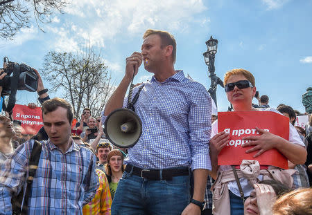 Russian opposition leader Alexei Navalny (C) attends a protest rally ahead of President Vladimir Putin's inauguration ceremony, Moscow, Russia May 5, 2018. REUTERS/Stringer