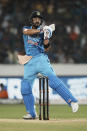 India's Virat Kohli bats during the third T20 cricket match between India and Australia, in Hyderabad, India, Sunday, Sept. 25, 2022. (AP Photo/Mahesh Kumar A)