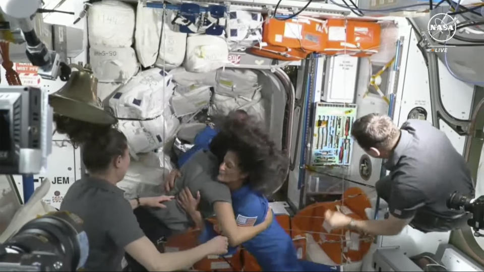 NASA astronauts Butch Wilmore and Suni Williams are greeted by the crew of the International Space Station on Thursday, June 6, 2024. (NASA via AP)