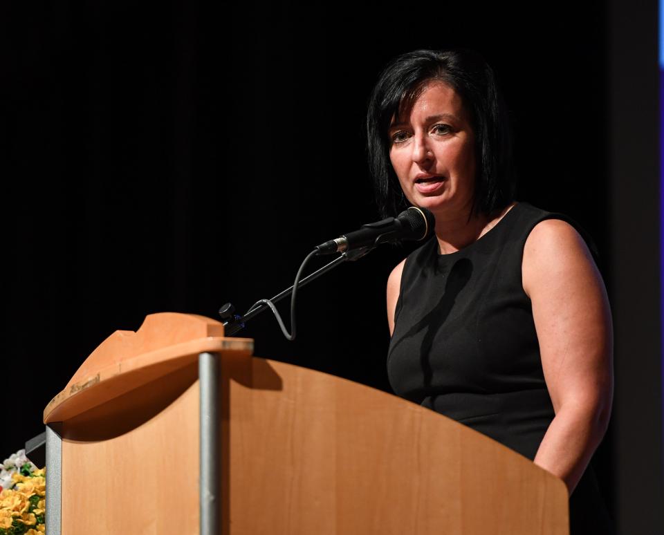Ryann Cline, executive director of the Ravenna Chamber of Commerce, announces the winners of 2023 Raven Awards at the 2024 Raven Award ceremony on Wednesday, June 5, 2024, in Ravenna, Ohio.
(Credit: Matthew Brown, Akron Beacon Journal)