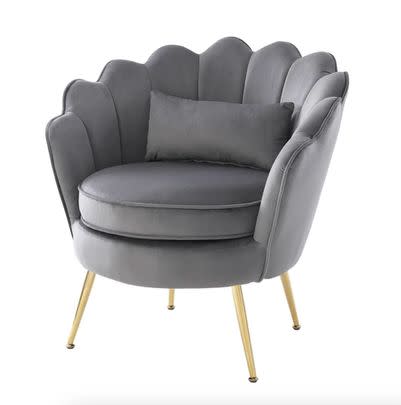A scallop top velvet chair