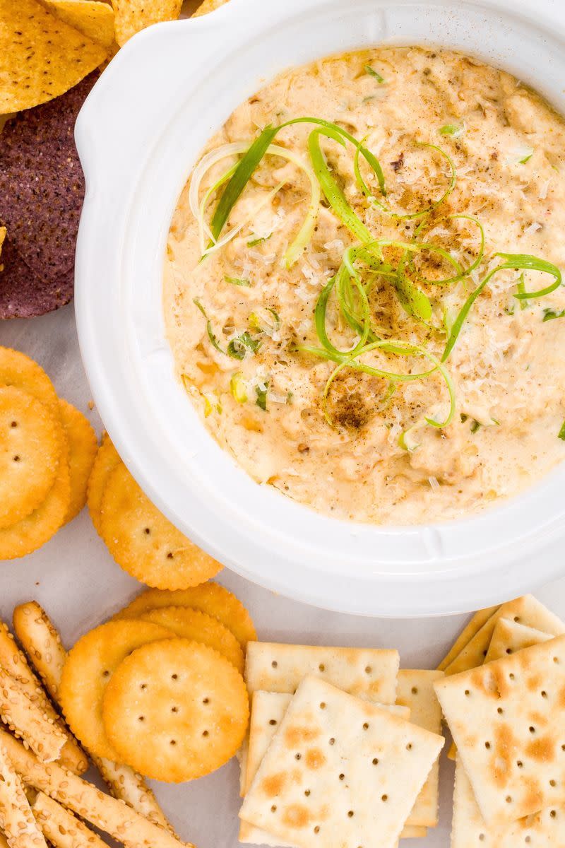 <p>This <a href="https://www.delish.com/uk/cooking/recipes/a30283219/easy-hot-crab-dip-recipe/" rel="nofollow noopener" target="_blank" data-ylk="slk:crab dip;elm:context_link;itc:0;sec:content-canvas" class="link ">crab dip</a> is a major favourite in the Delish kitchen. Served with Ritz crackers on the side, it'll be gone in under an hour, no question. </p><p>Get the <a href="http://www.delish.com/uk/cooking/recipes/a32978179/slow-cooker-crab-dip-recipe/" rel="nofollow noopener" target="_blank" data-ylk="slk:Slow Cooker Crab Dip;elm:context_link;itc:0;sec:content-canvas" class="link ">Slow Cooker Crab Dip</a> recipe. </p>