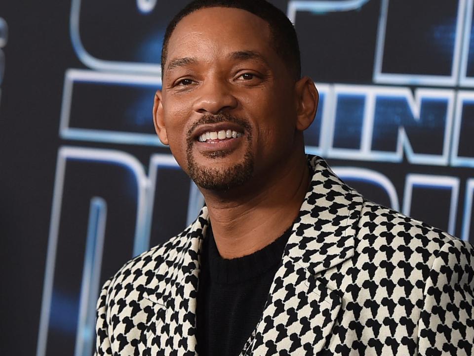 will smith smiles on a red carpet for spies in disguise in december 2019