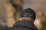 An agent wearing a FBI Bomb Technician hat walks outside a home in the Brooklyn borough of New York City, while they investigate an earlier incident of the reported explosion at the New York Port Authority Bus Terminal in Manhattan, in New York City, New York, U.S. December 11, 2017. REUTERS/Lucas Jackson