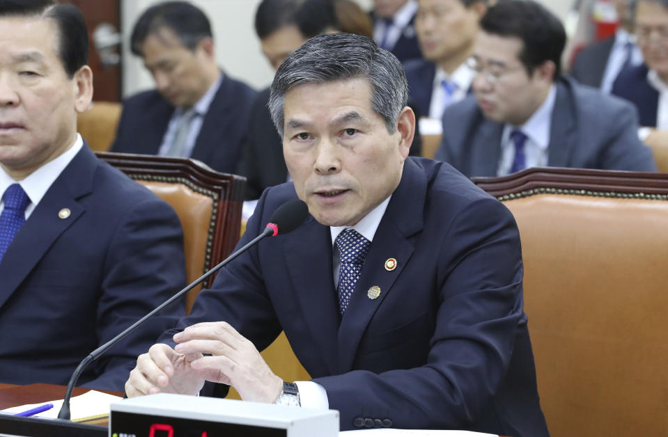 South Korean Defense Minister Jeong Kyeong-doo answers a lawmaker's question about North Koreans' deportation during a defense committee meeting at the National Assembly in Seoul, South Korea, Thursday, Nov. 7, 2019. South Korea says it has deported 2 North Koreans after finding they had killed 16 fellow fishermen onboard and fled to South Korea. (Kim Ju-hyung/Yonhap via AP)