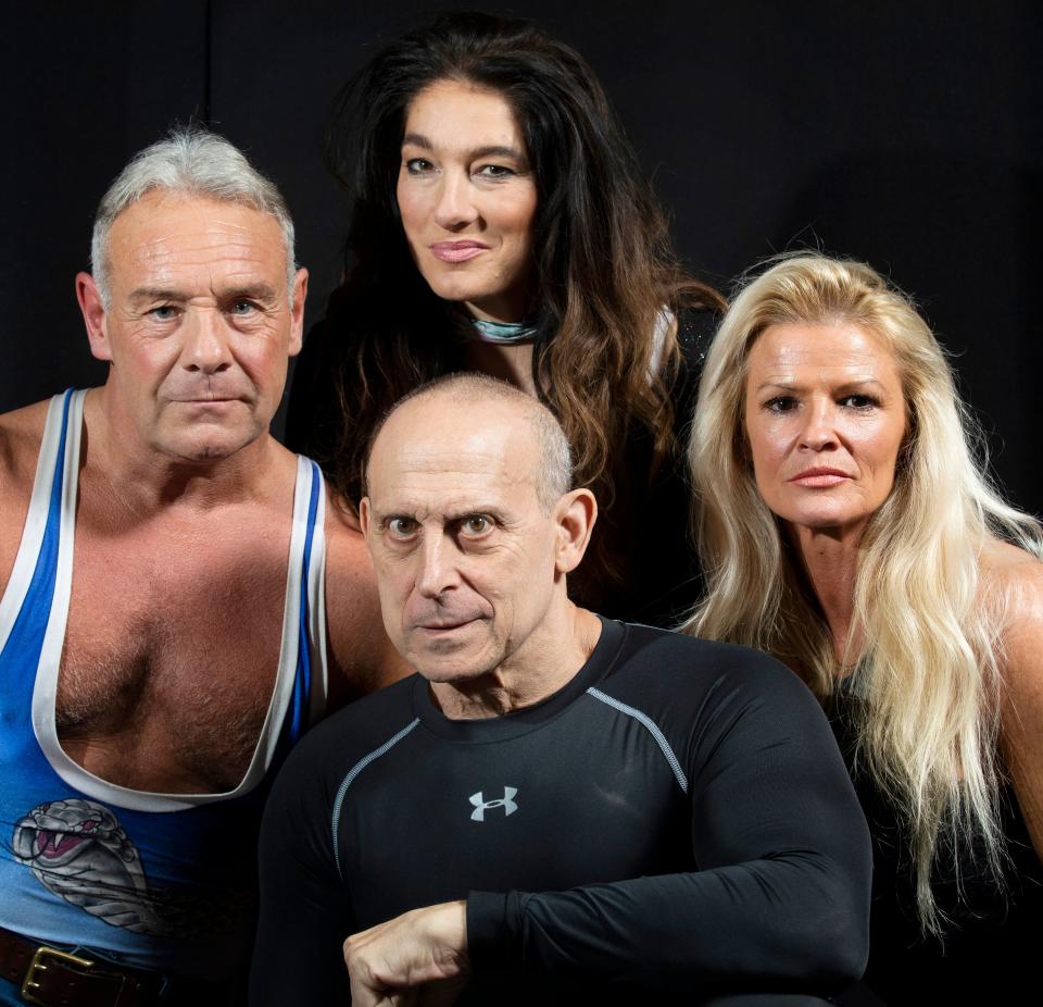 Original Gladiators Michael Wilson (Cobra), Diane Youdale (Jet), Kim Betts (Lightning) and Michael Van Wijk (Wolf) at ComicCon on 2019. (Shutterstock)