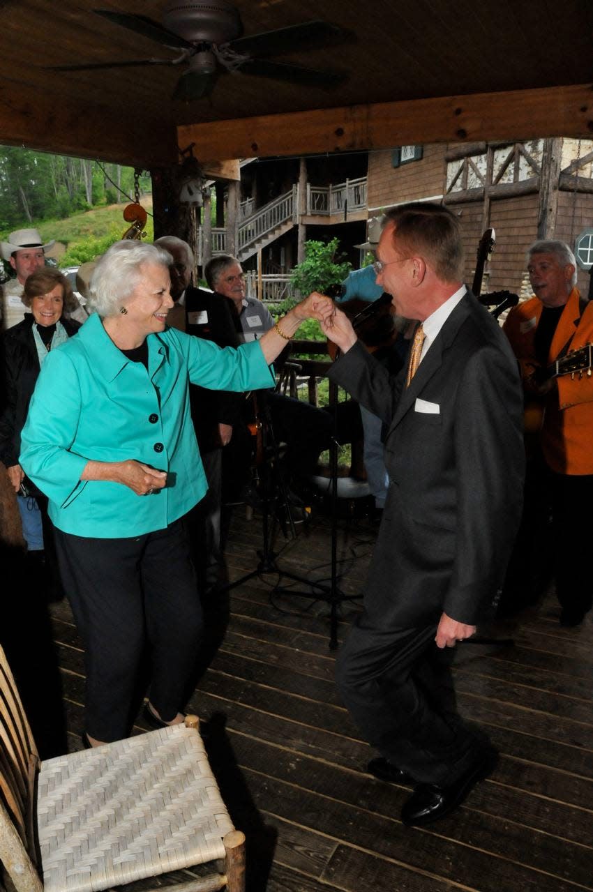 Knoxville lawyer Mark K. Williams in his capacity as chairman of the board of Friends of the Smokies, a support group for the Great Smoky Mountains National Park, taught former U.S. Supreme Court Justice Sandra Day O'Connor how to clog at an event on June 3, 2009, at Buckberry Lodge in Gatlinburg.