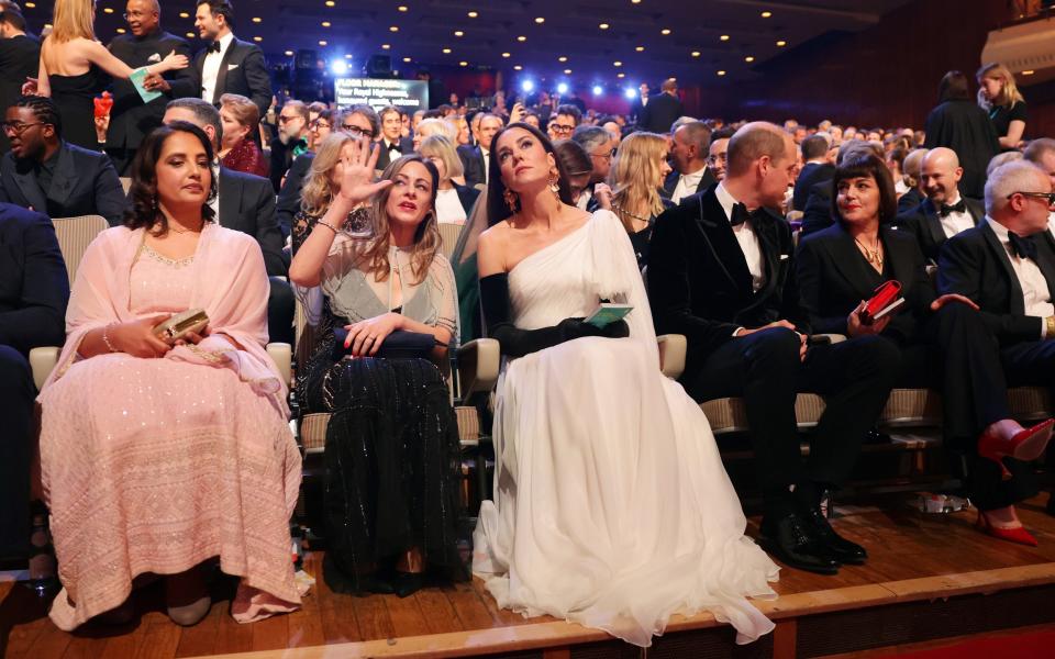 Princess of Wales (C) and Prince William, Prince of Wales, (C-R) take their seats - Chris Jackson