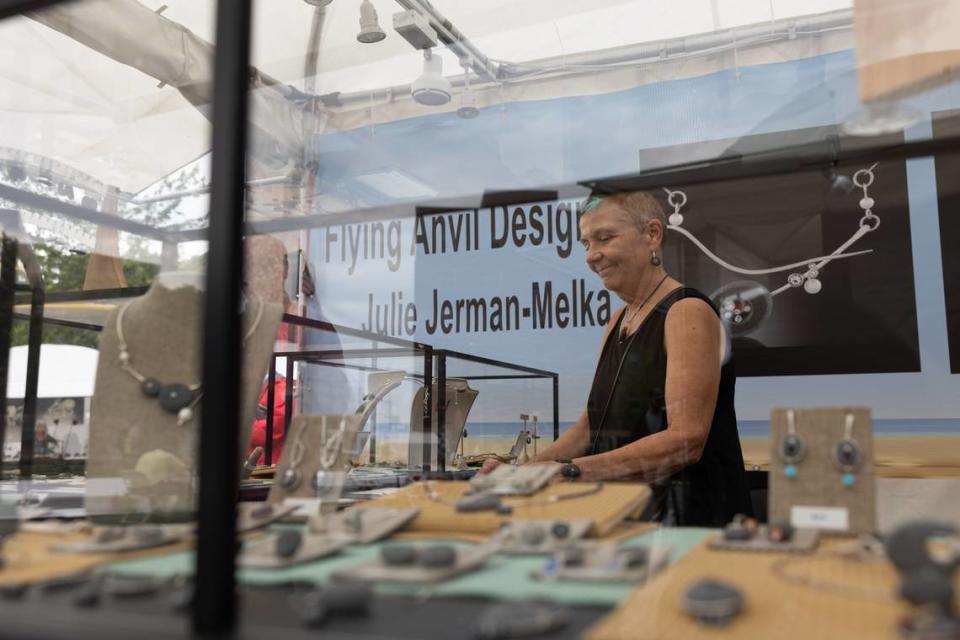 Jewelry maker Julie Jerman-Melka sells wares during the first day of Belleville’s Art on the Square on May 17, 2024. The show continues Saturday and Sunday.