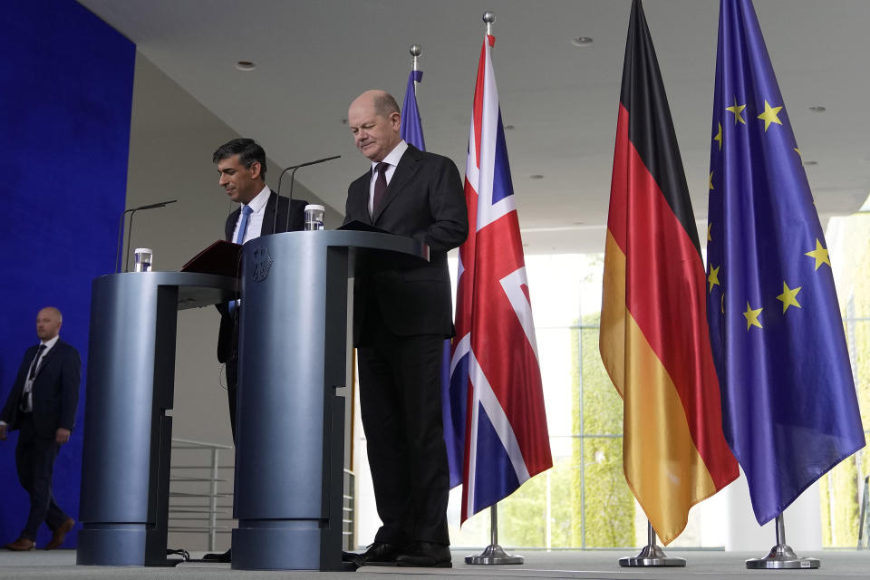 Britain's Prime Minister Rishi Sunak, left, and German Chancellor Olaf Scholz prepare for a press conference in Berlin, Germany, Wednesday, April 24, 2024.(AP Photo/Alastair Grant, Pool)