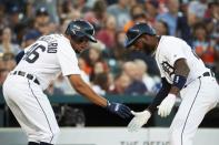 Aug 10, 2018; Detroit, MI, USA; Detroit Tigers second baseman Niko Goodrum (28) celebrates with third baseman Jeimer Candelario (46) after hitting a two run home run in the fourth inning against the Minnesota Twins at Comerica Park. Mandatory Credit: Rick Osentoski-USA TODAY Sports