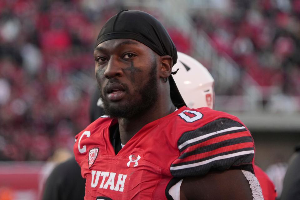 Utah linebacker Devin Lloyd (0) watches from the sidelines in the second half of an NCAA college football game against Colorado Friday, Nov. 26, 2021, in Salt Lake City. (AP Photo/George Frey)