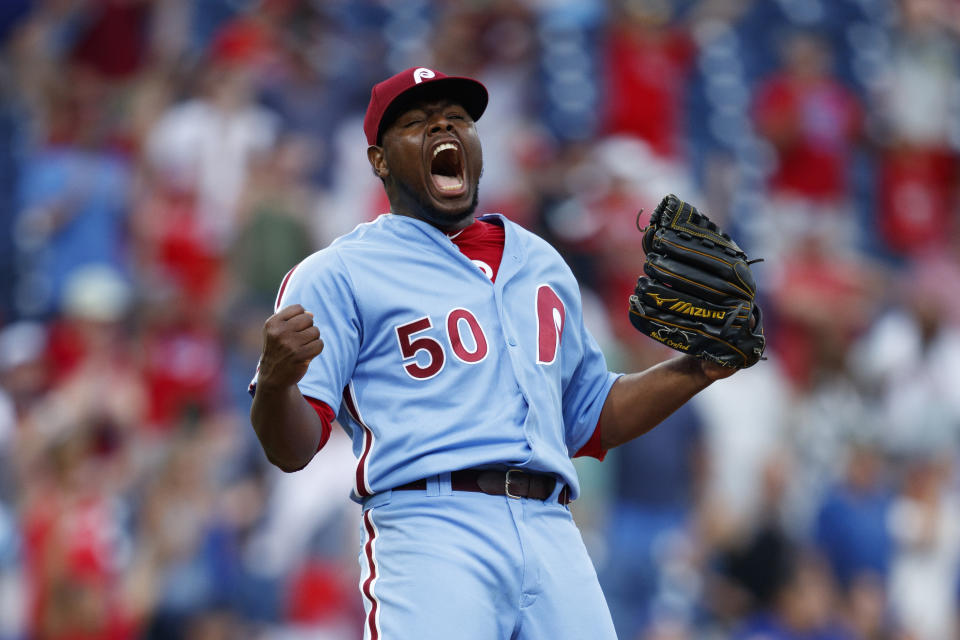 Philadelphia Phillies relief pitcher Hector Neris celebrates after Los Angeles Dodgers' Justin Turner flied out to end a baseball game, Thursday, July 18, 2019, in Philadelphia. Philadelphia won 7-6. (AP Photo/Matt Slocum)