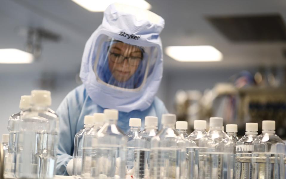 Scientists test the procedures for the manufacturing of the mRNA for the Covid-19 vaccine at German company BioNTech's headquarters - Getty