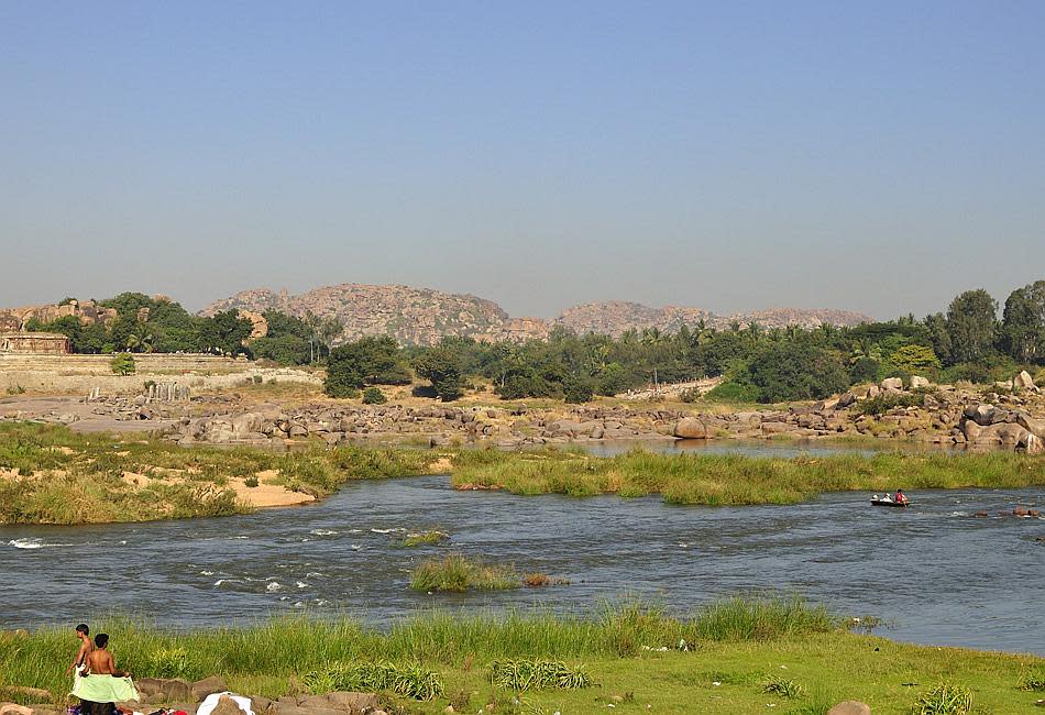 A coracle ride on the Tungabhadra River can take you to the Vijaya Vittala temple complex. Striking rocky landscapes envelop the river. The rich, blue, gurgling water attracts <a href="http://in.lifestyle.yahoo.com/island-of-birds-%E2%80%93-among-the-river-terns-of-bhadra-20120301.html" data-ylk="slk:River Terns;elm:context_link;itc:0;sec:content-canvas;outcm:mb_qualified_link;_E:mb_qualified_link;ct:story;" class="link  yahoo-link">River Terns</a> and Kingfishers.<br><br>