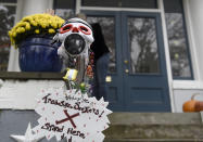 Carol McCarthy sends candy down the candy chute that she will use to give out treats to socially-distant trick-or-treaters on Halloween, Monday, Oct. 26, 2020, in Palmyra, N.J. (AP Photo/Michael Perez)