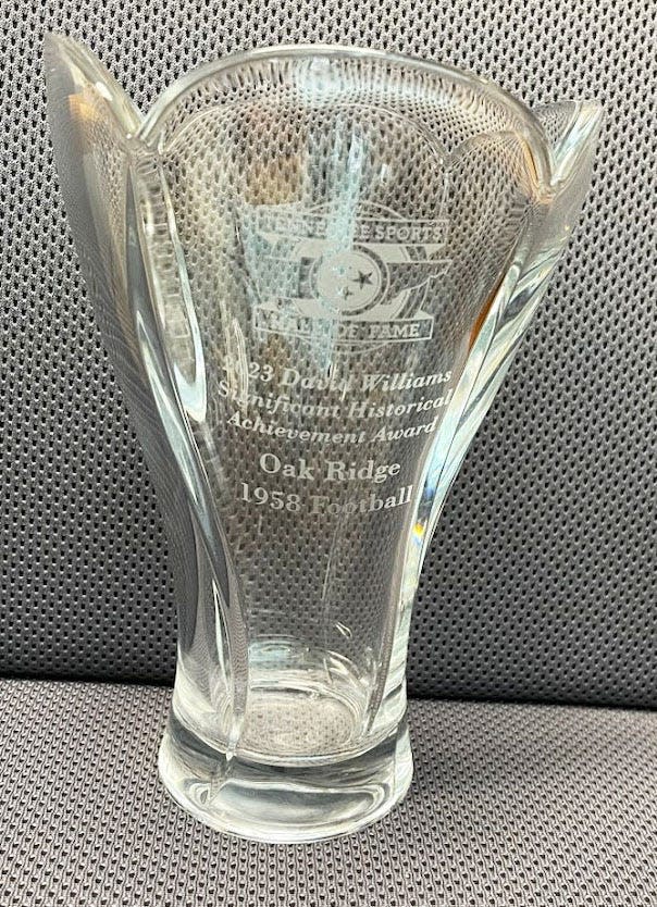 A closeup of the commemorative award cup. It will be displayed at Oak Ridge High School.