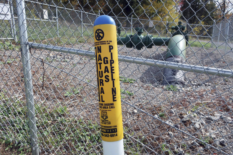 A MarkWest Liberty natural gas pipeline and fracking well cap is seen in Valencia, Pennsylvania on Wednesday, Oct. 14, 2020. President Trump accuses Joe Biden of wanting to ban fracking, a sensitive topic in the No. 2 natural gas state behind Texas. Biden insists he does not want to ban fracking broadly - he wants to ban it on federal lands and make electricity production fossil-fuel free by 2035. (AP Photo/Ted Shaffrey)