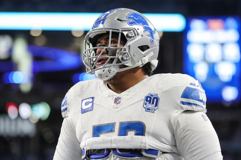Detroit Lions offensive tackle Penei Sewell (58) warms up before the Dallas Cowboys game at AT&T Stadium in Arlington, Texas on Saturday, Dec. 30, 2023.