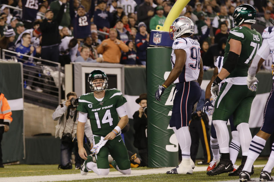 New York Jets quarterback Sam Darnold (14) reacts after the New England Patriots scored a safety during the second half of an NFL football game Monday, Oct. 21, 2019, in East Rutherford, N.J. (AP Photo/Adam Hunger)