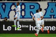 Marseille's Clinton Njie (L) celebrates after scoring against Rennes on February 18, 2017, at the Velodrome stadium in Marseille, southern France