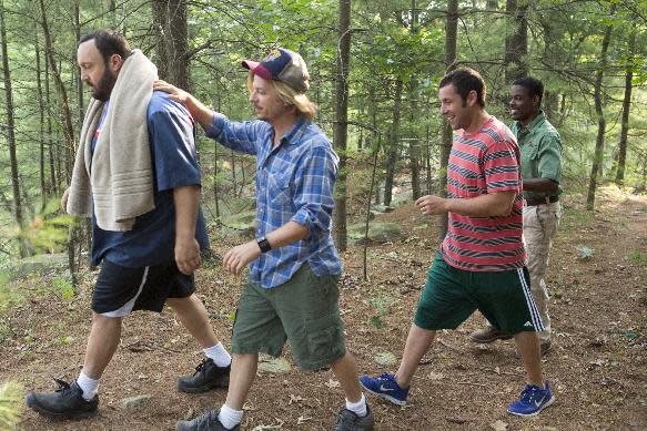 This film publicity image released by Columbia Pictures shows, from left, Kevin James, David Spade, Adam Sandler and Chris Rock in a scene from "Grown Ups 2." (AP Photo/Sony - Columbia Pictures, Tracy Bennett)