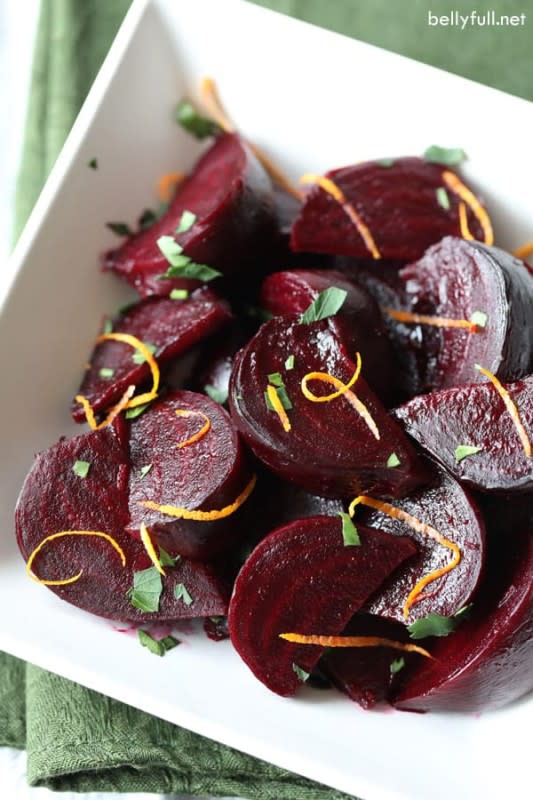 <p>Bellyfull</p><p>Tender roasted beets are coated with an orange and maple glaze that makes for a fantastic and super easy side dish, great for the holidays and all year round!</p><p><strong>Get the recipe: </strong><a href="https://bellyfull.net/roasted-beets-with-orange-and-maple-glaze/" rel="nofollow noopener" target="_blank" data-ylk="slk:Roasted Beets with Orange and Maple Glaze;elm:context_link;itc:0;sec:content-canvas" class="link "><strong>Roasted Beets with Orange and Maple Glaze</strong></a></p>