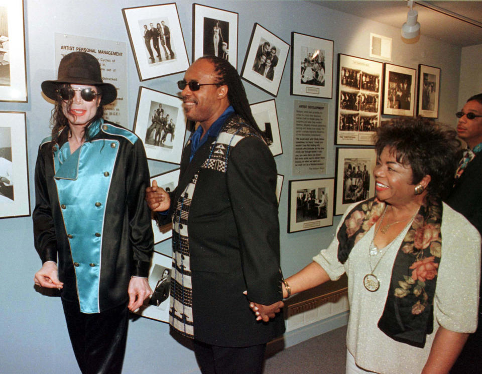 Musicians Michael Jackson (L) and Stevie Wonder (C) along with Esther Gordy Edward (R), sister of Berry Gordy, founder of Motown, visit the Motown museum in Detroit in this August 4,1997 file photo. Jackson, the child star turned King of Pop who set the world dancing but whose musical genius was overshadowed by a bizarre lifestyle and sex scandals, died on June 25, 2009. He was 50.  REUTERS/Rebecca Cook/Files (UNITED STATES ENTERTAINMENT OBITUARY)