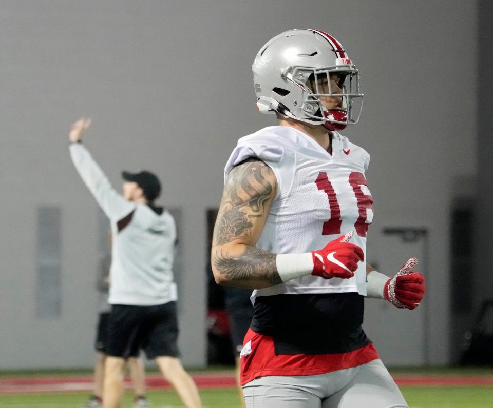 Ohio State University tight end Cade Stover (16) runs a drill during the first practice of spring football for the Buckeyes at the Woody Hayes Athletic Center in Columbus on Tuesday, March 8, 2022.