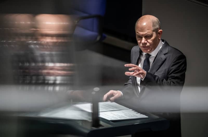 German Chancellor Olaf Scholz delivers a government statement on the European Council during a session at the German Bundestag. Kay Nietfeld/dpa