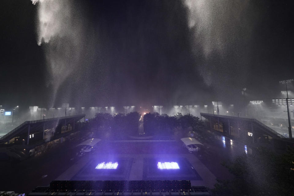 Rain falls outside Arthur Ashe Stadium during the second round of the US Open tennis championships, Wednesday, Sept. 1, 2021, in New York. (AP Photo/Frank Franklin II)