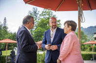 Charles Michel, EU Council President, center, talks with Kristalina Georgieva Managing Director of the International Monetary Fund (IMF), and Tedros Adhanom Ghebreyesus, Director General of the World Health Organization (WHO), left, during the G7 leaders summit at Castle Elmau in Kruen, near Garmisch-Partenkirchen, Germany, on Monday, June 27, 2022. The Group of Seven leading economic powers are meeting in Germany for their annual gathering Sunday through Tuesday. (Michael Kappeler/Pool via AP)