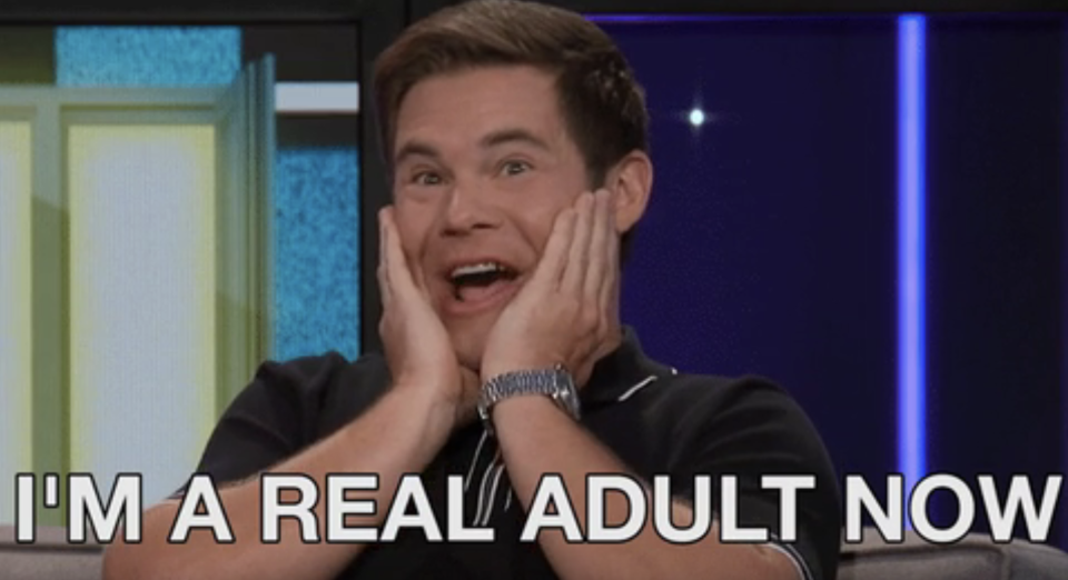 Adam Devine, making a surprised face with hands on his cheeks, captioned with "I'M A REAL ADULT NOW"